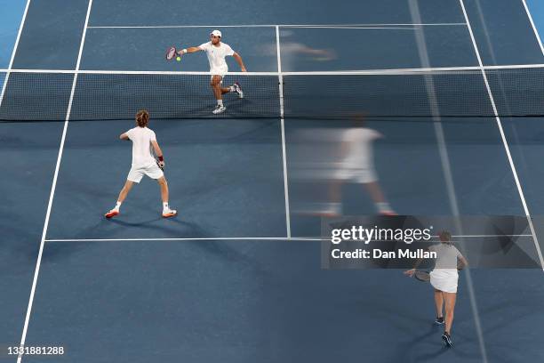 Andrey Rublev and Anastasia Pavlyuchenkova of Team ROC play Aslan Karatsev and Elena Vesnina of Team ROC during their Mixed Doubles Gold Medal match...