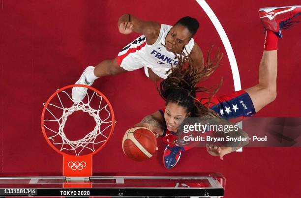 Brittney Griner of Team United States goes up for a shot against Sandrine Gruda of Team France during the first half of a Women's Basketball...