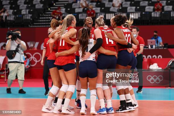 Team United States celebrates after defeating Team Italy during the Women's Preliminary - Pool B volleyball on day ten of the Tokyo 2020 Olympic...