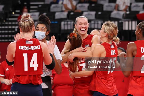 Team United States celebrates after defeating Team Italy during the Women's Preliminary - Pool B volleyball on day ten of the Tokyo 2020 Olympic...