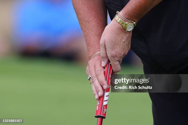 Detail shot of Laura Davies of England as she grips her putter on the 13th green during the final round of the 2021 U.S. Senior Women's Open at...