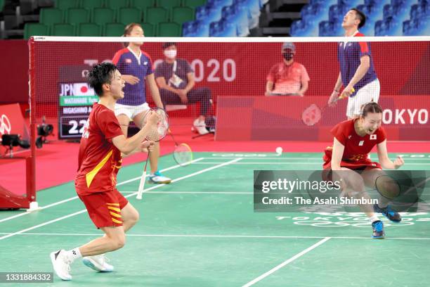 Arisa Higashino and Yuta Watanabe of Team Japan celebrate winning the bronze after their victory in the Mixed Doubles bronze medal match against Tse...