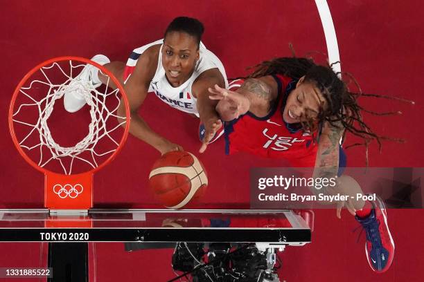 Brittney Griner of Team United States goes up for a shot against Sandrine Gruda of Team France during the first half of a Women's Basketball...