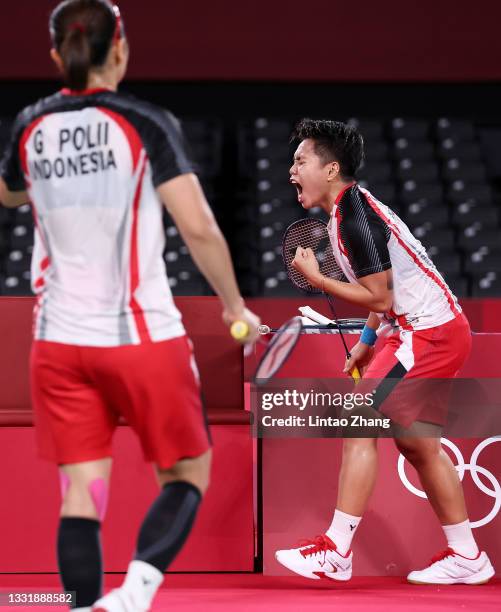 Greysia Polii and Apriyani Rahayu of Team Indonesia react as they compete against Chen Qing Chen and Jia Yi Fan of Team China during the Women’s...