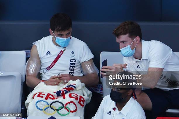 Tom Daley of Team Great Britain knits during the Men's 3m Springboard Preliminary Round on day ten of the Tokyo 2020 Olympic Games at Tokyo Aquatics...