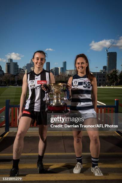 Collingwood VFLW captain Caitlin Bunker and Geelong VFLW captain Breanna Beckley pose for a photo during a 2021 VFLW Grand Final Media Opportunity at...