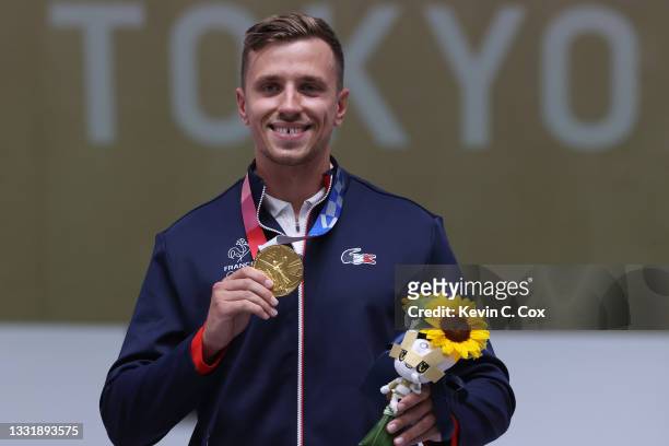 Gold Medalist Jean Quiquampoix of Team France during the medal ceremony following the 25m Rapid Fire Pistol Men's Finals on day ten of the Tokyo 2020...