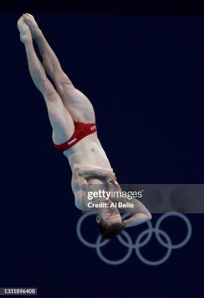 Martin Wolfram of Team Germany competes in the Men's 3m Springboard Preliminary Round on day ten of the Tokyo 2020 Olympic Games at Tokyo Aquatics...