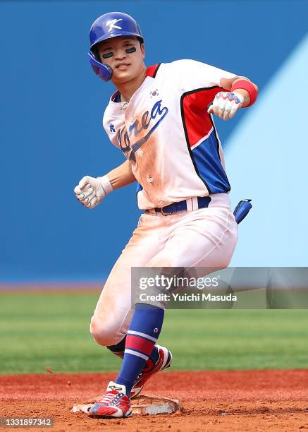 Hae Min Park of Team South Korea celebrates after hitting a two-RBI double to left field in the fifth inning against Team Israel as second base...