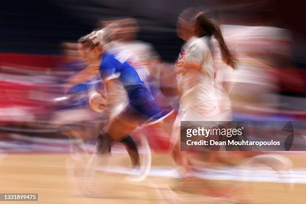 Polina Kuznetsova of Team ROC runs with the ball during the Women's Preliminary Round Group B handball match between Spain and ROC on day ten of the...