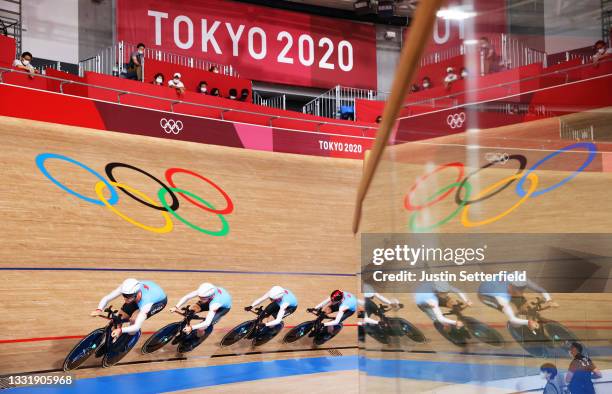 Michael Foley of Team Canada and teammates sprint during the Men´s team pursuit qualifying of the Track Cycling on day 10 of the Tokyo Olympics 2021...