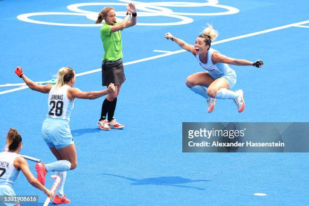 Agustina Albertarrio of Team Argentina celebrates scoring the first goal with during the Women's Quarterfinal match between Germany and Argentina on...