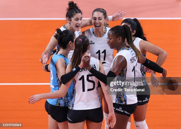 Team Argentina celebrates after the play against Team China during the Women's Preliminary - Pool B volleyball on day ten of the Tokyo 2020 Olympic...