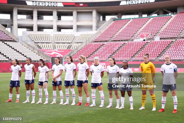Players of Team United States stand for the national anthem prior to the Women's Semi-Final match between USA and Canada on day ten of the Tokyo...