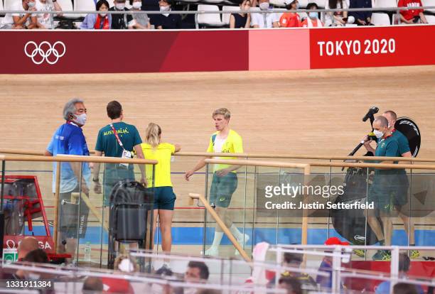 Alexander Porter of Team Australia after his fall is attended by its staff during the Men´s team pursuit qualifying of the Track Cycling on day 10 of...