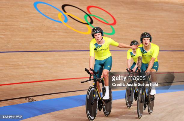 Kelland O'Brien and Sam Welsford are disappointed after the fall of Alexander Porter of Team Australia during the Men´s team pursuit qualifying of...