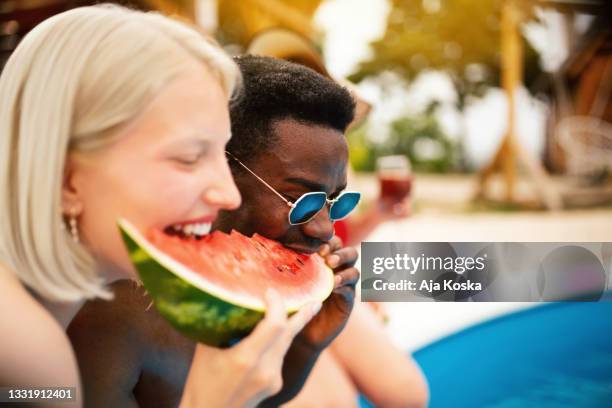 pool party. - eating competition stock pictures, royalty-free photos & images