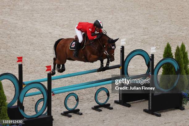 Ryuzo Kitajima of Team Japan riding Feroza Nieuwmoed competes during the Eventing Jumping Team Final and Individual Qualifier on day ten of the Tokyo...