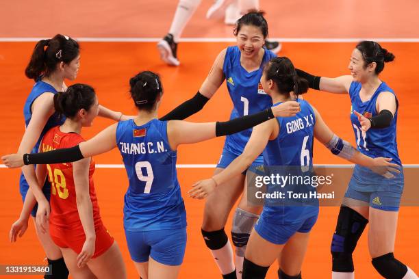 Team China celebrate after the play against Team Argentina during the Women's Preliminary - Pool B volleyball on day ten of the Tokyo 2020 Olympic...