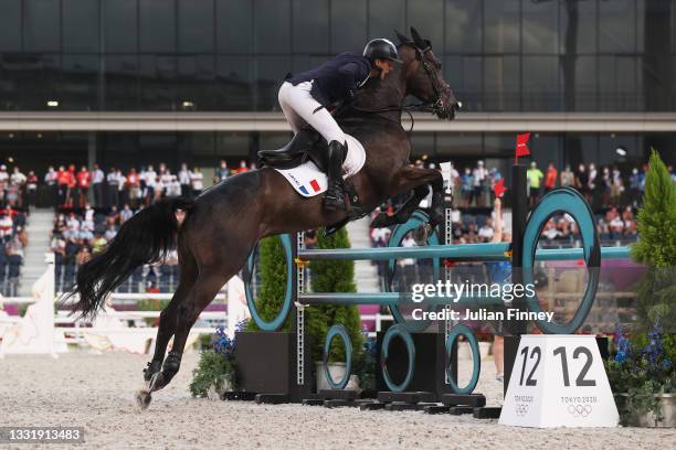 Nicolas Touzaint of Team France riding Absolut Gold competes during the Eventing Jumping Team Final and Individual Qualifier on day ten of the Tokyo...
