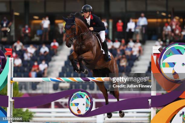 Tom Mcewen of Team Great Britain riding Toledo de Kerser competes during the Eventing Jumping Team Final and Individual Qualifier on day ten of the...