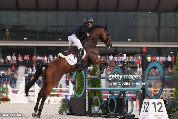 Tom Mcewen of Team Great Britain riding Toledo de Kerser competes during the Eventing Jumping Team Final and Individual Qualifier on day ten of the...