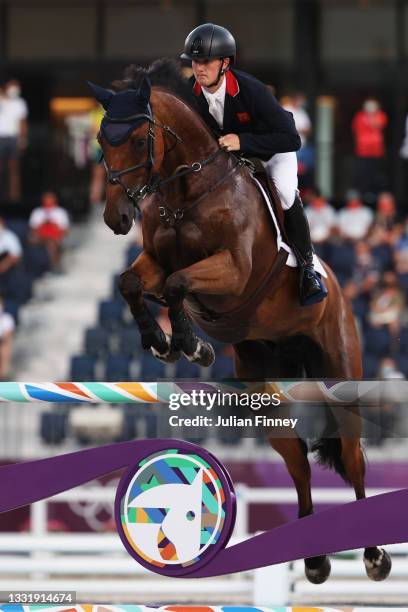 Tom Mcewen of Team Great Britain riding Toledo de Kerser competes during the Eventing Jumping Team Final and Individual Qualifier on day ten of the...