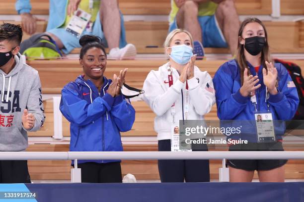 Simone Biles, MyKayla Skinner and Grace McCallum applaud during the Women's Floor Exercise Final on day ten of the Tokyo 2020 Olympic Games at Ariake...