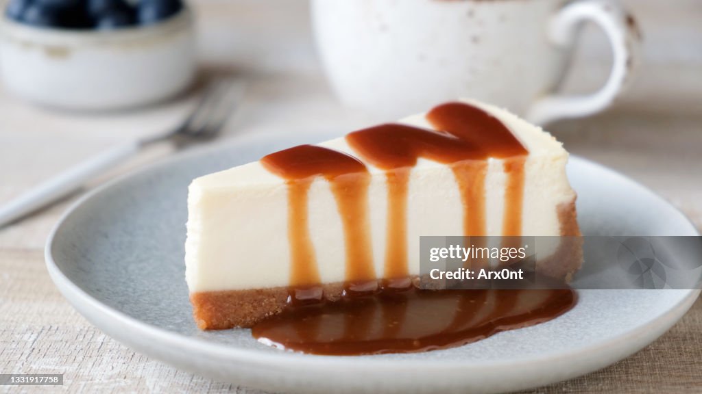 Slice of cheesecake with caramel sauce