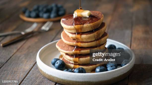 buckwheat pancakes with syrup and blueberries - crepe pancake stock pictures, royalty-free photos & images