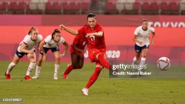 Jessie Fleming of Team Canada scores their side's first goal from the penalty spot during the Women's Semi-Final match between USA and Canada on day...