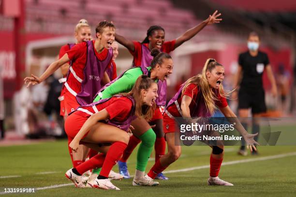 Players of Team Canada celebrate their side's first goal scored by Jessie Fleming of Team Canada during the Women's Semi-Final match between USA and...