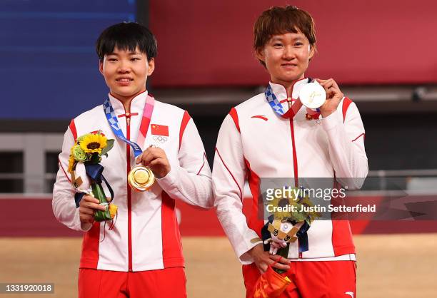 Shanju Bao and Tianshi Zhong of Team China poses with the gold medal after the Women's team sprint finals of the Track Cycling on day 10 of the Tokyo...