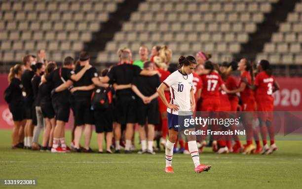 Carli Lloyd of Team United States looks dejected following defeat in the Women's Semi-Final match between USA and Canada on day ten of the Tokyo...