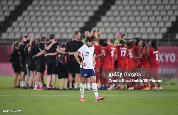 Carli Lloyd of the United States leaves the field during the Women's Semi-Final match between USA and Canada on day ten of the Tokyo Olympic Games at...