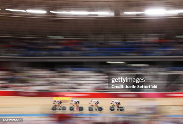 Jennifer Valente, Emma White, Chloe Dygert and Lily Williams of Team United States sprint during the Women's team pursuit qualifying of the Track...