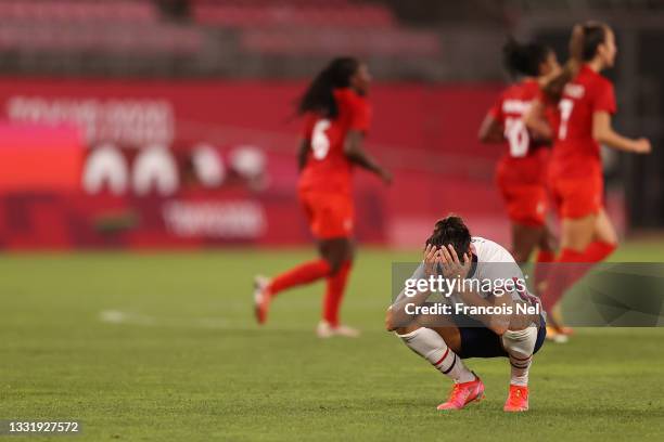 Carli Lloyd of Team United States looks dejected following defeat in the Women's Semi-Final match between USA and Canada on day ten of the Tokyo...