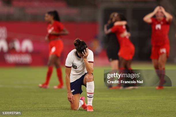 Carli Lloyd of Team United States looks dejected following defeat in the Women's Semi-Final match between USA and Canada on day ten of the Tokyo...