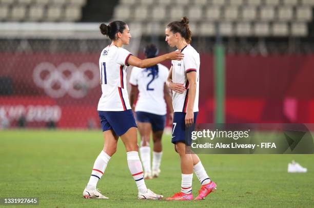 Christen Press of Team United States consoles Tobin Heath following defeat in the Women's Semi-Final match between USA and Canada on day ten of the...