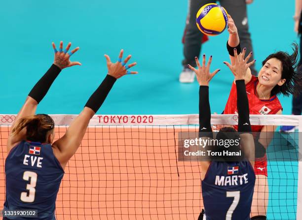 Sarina Koga of Team Japan competes against Lisvel Elisa Eve Mejia and Niverka Dharlenis Marte Frica of Team Dominican Republic during the Women's...