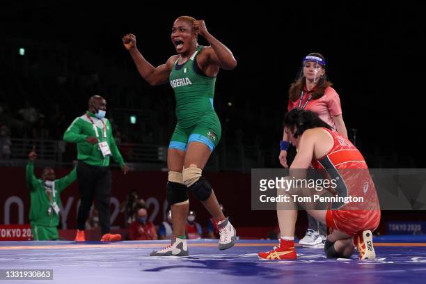 Blessing Oborududu of Team Nigeria celebrates after defeating Battsetseg Soronzonbold of Team Mongolia during the Women's Freestyle 68kg Semifinal on...