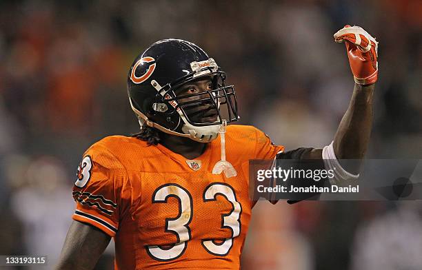 Charles Tillman of the Chicago Bears encourages the crowd against the Detroit Lions at Soldier Field on November 13, 2011 in Chicago, Illinois. The...