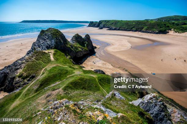 three cliffs bay gower coastline - cliff stock pictures, royalty-free photos & images