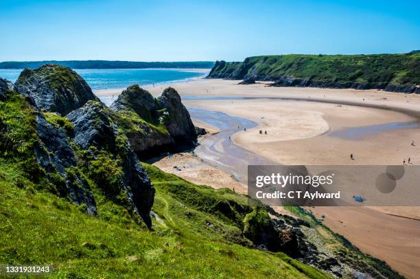 three cliffs bay gower coastline - gower peninsula stock pictures, royalty-free photos & images