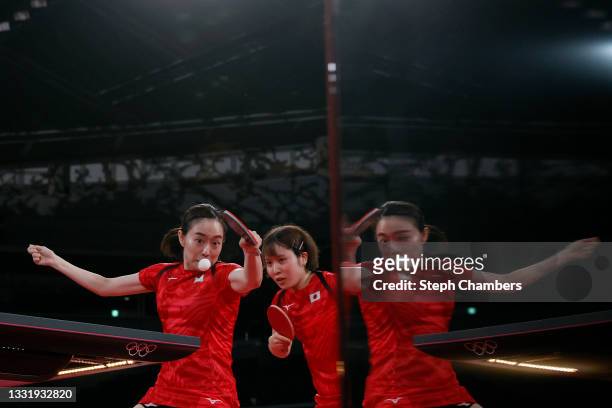 Kasumi Ishikawa and Miu Hirano of Team Japan in action during their Women's Team Quarterfinals table tennis match on day ten of the Tokyo 2020...