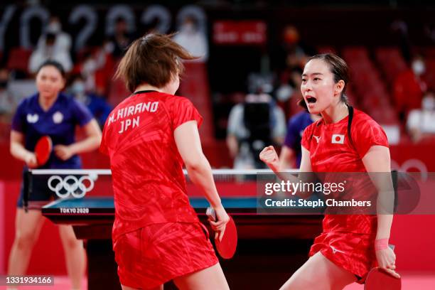 Kasumi Ishikawa and Miu Hirano of Team Japan react during their Women's Team Quarterfinals table tennis match on day ten of the Tokyo 2020 Olympic...