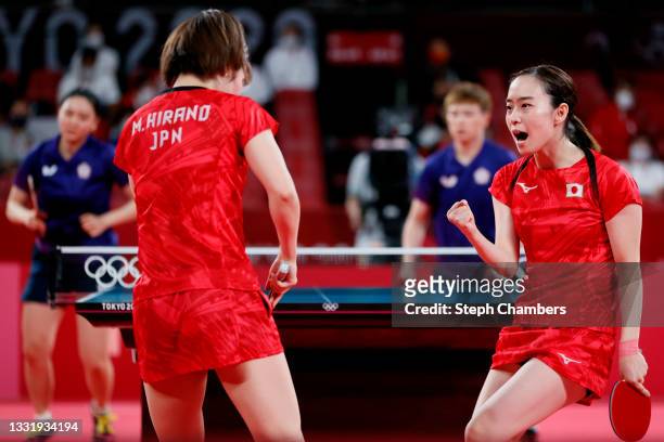 Kasumi Ishikawa and Miu Hirano of Team Japan react during their Women's Team Quarterfinals table tennis match on day ten of the Tokyo 2020 Olympic...