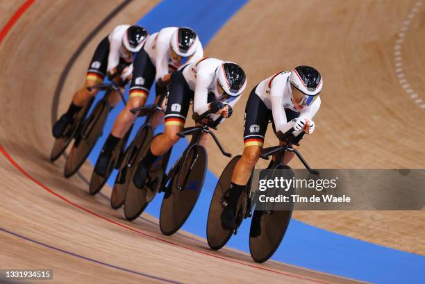 Lisa Brennauer of Team Germany and teammates sprint during the Women's team pursuit qualifying of the Track Cycling on day 10 of the Tokyo Olympics...