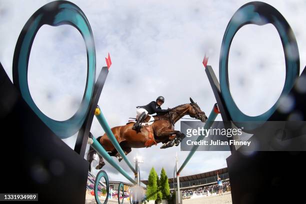 Fouaad Mirza of Team India riding Seigneur competes during the Eventing Jumping Team Final and Individual Qualifier on day ten of the Tokyo 2020...