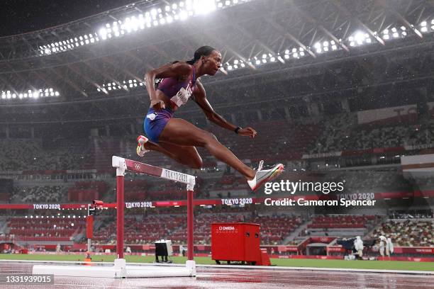 Dalilah Muhammad of Team United States competes in the Women's 400 metres hurdles semi finals on day ten of the Tokyo 2020 Olympic Games at Olympic...